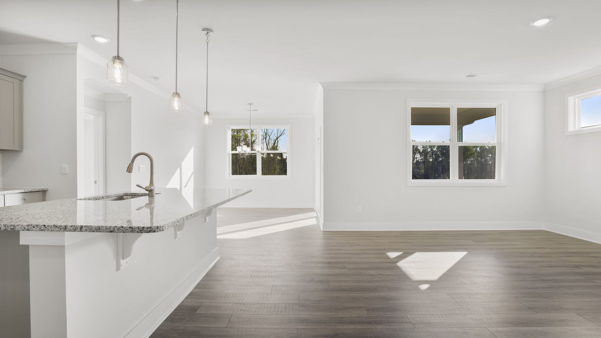 Family room with windows and fireplace.