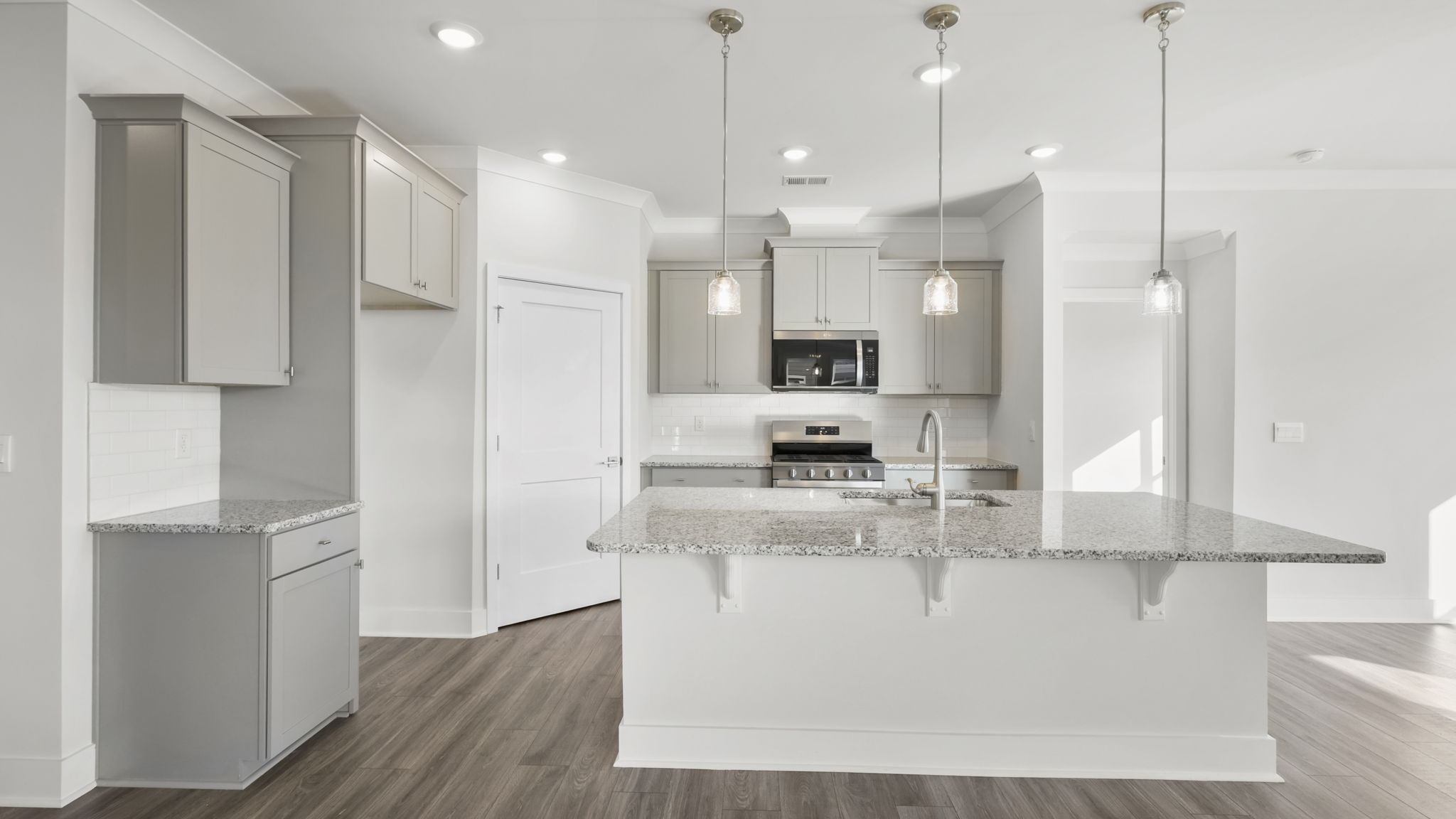 Family room with view of kitchen.