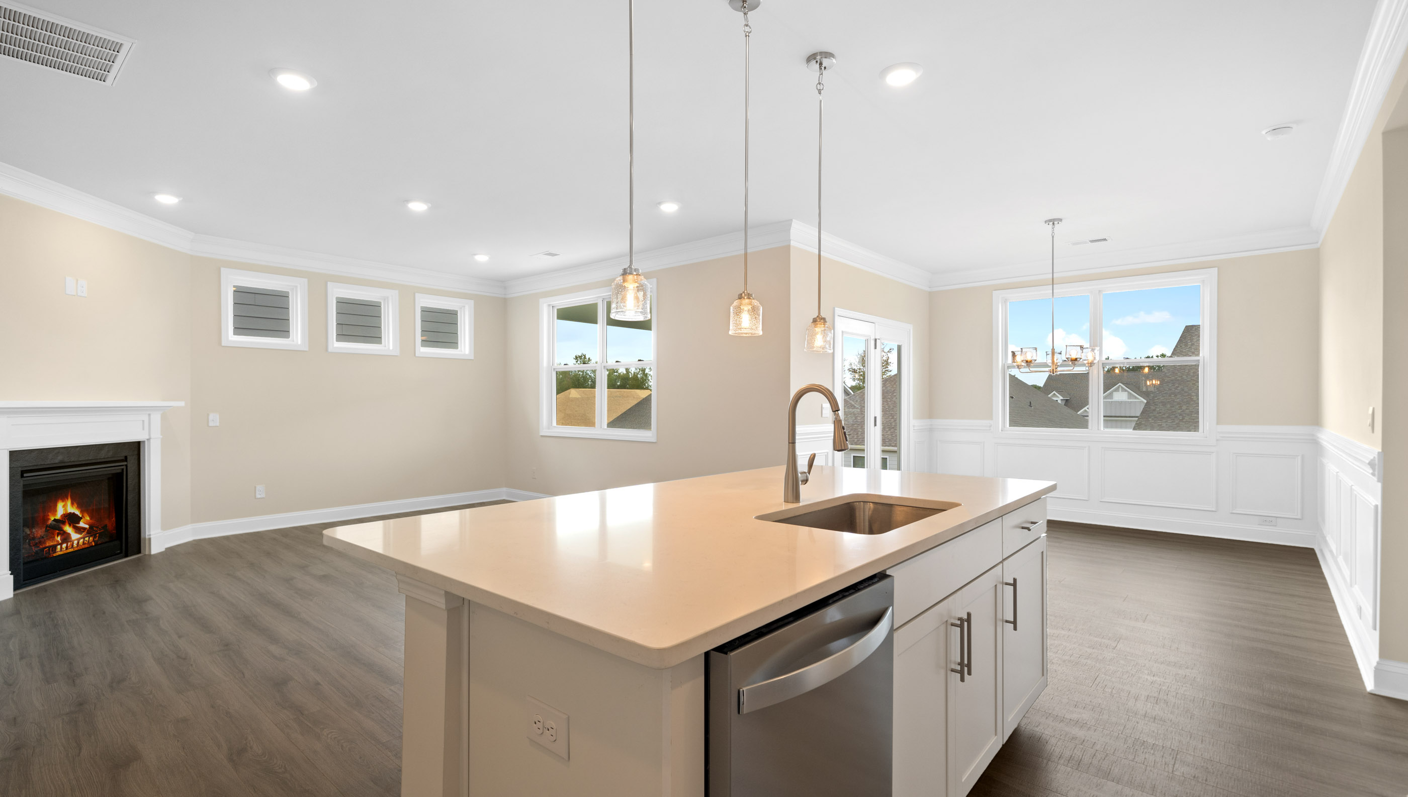 Kitchen and island with granite counter tops.