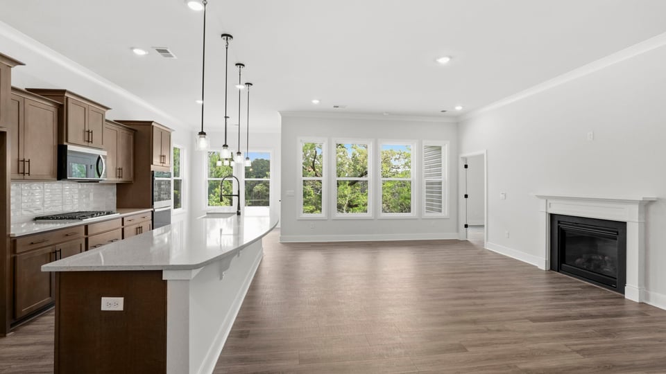 Family room with windows and fireplace.