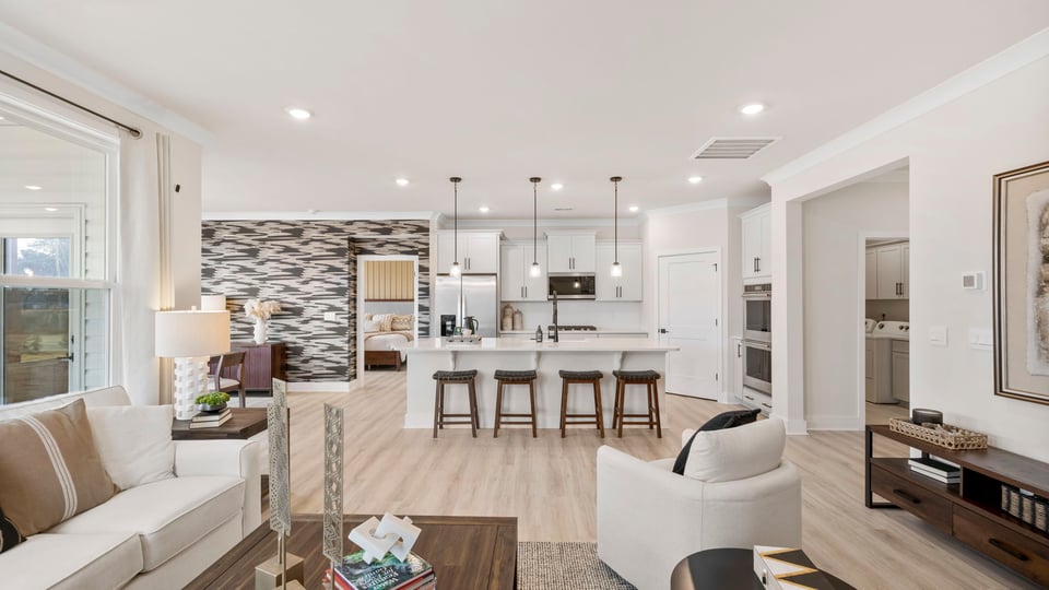 Family room with fireplace and windows.