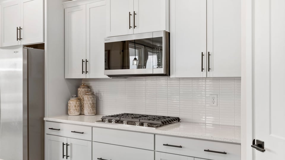 Kitchen with stainless steel appliances.