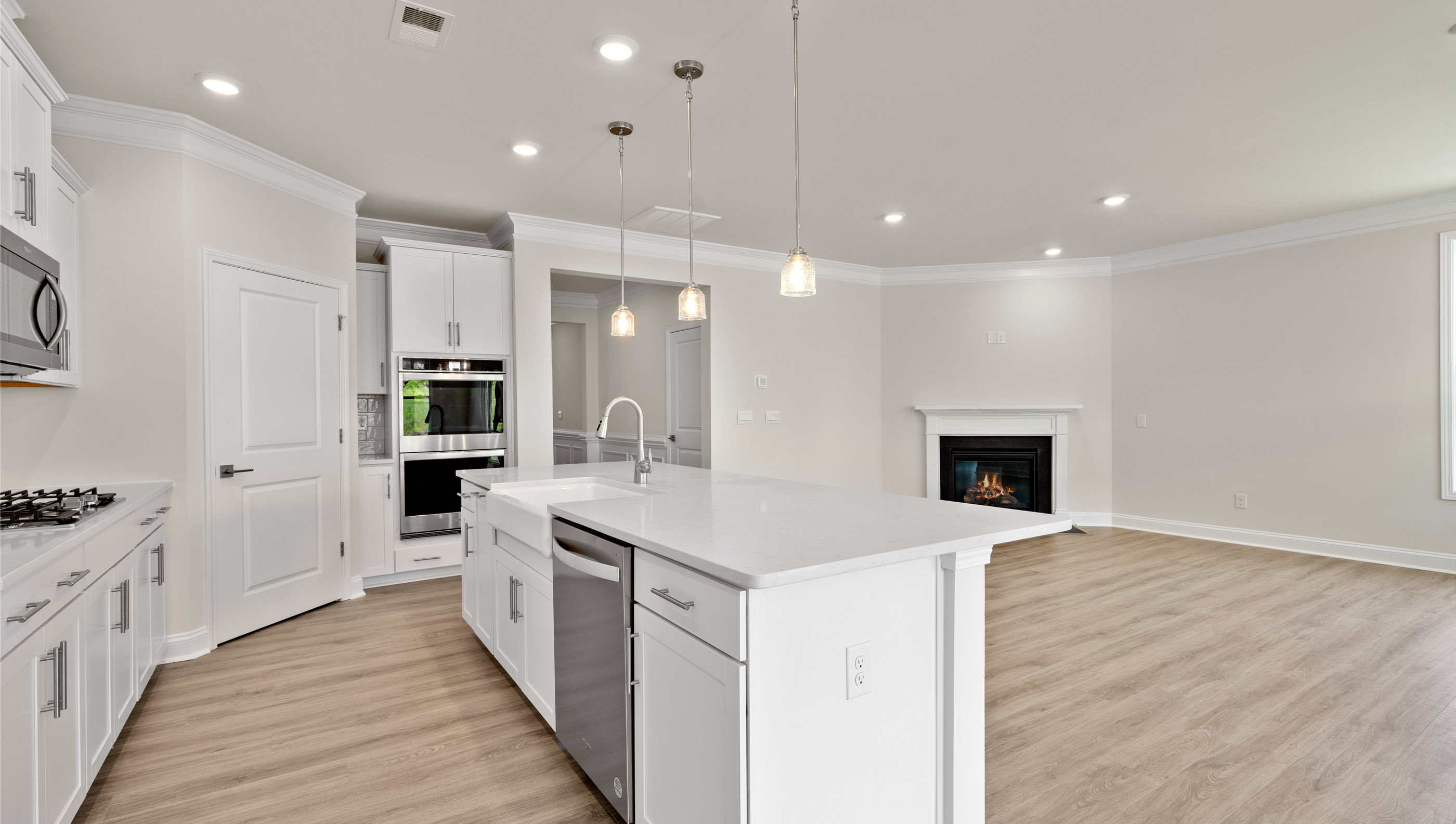Kitchen and island with granite counter tops.