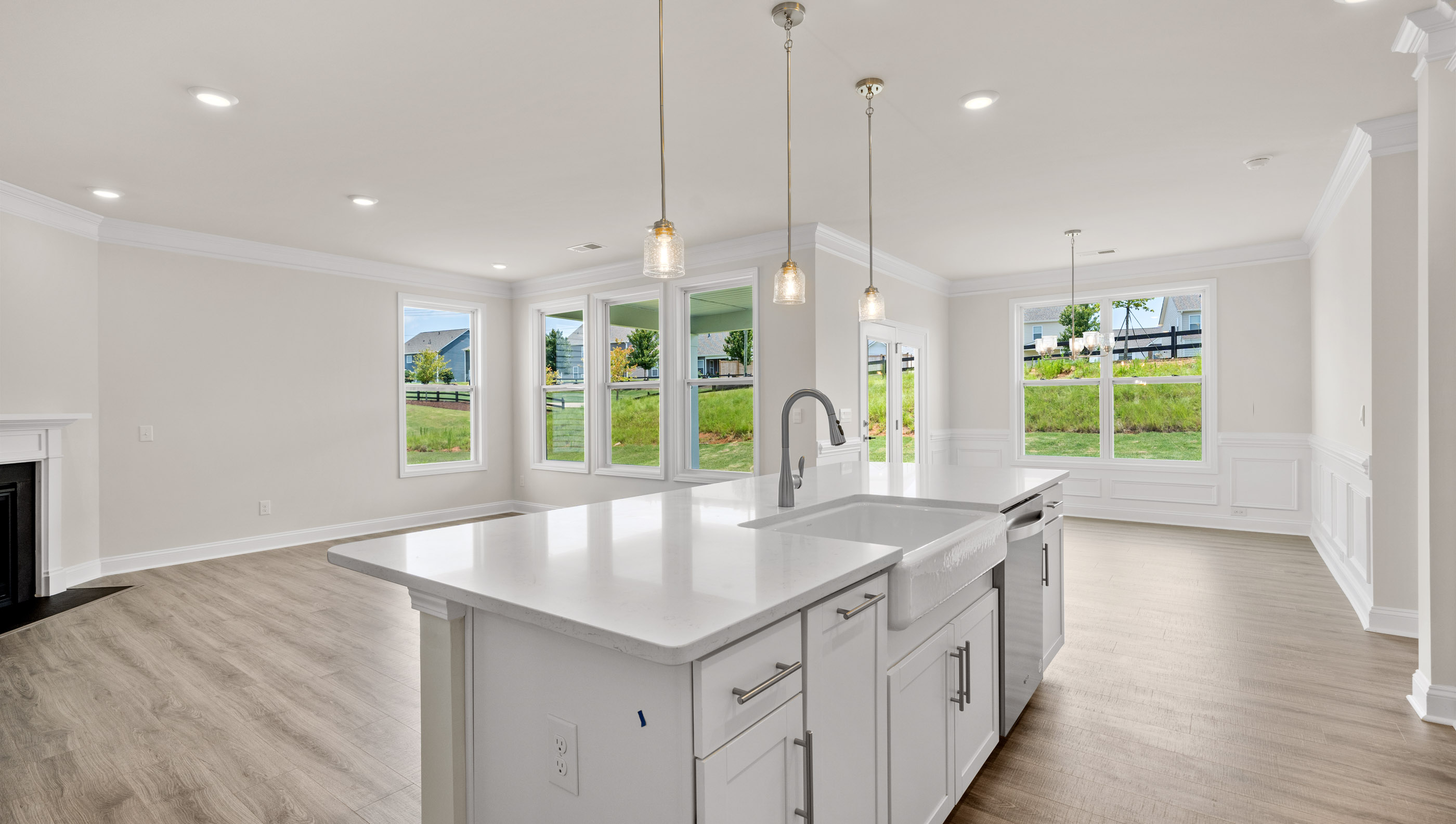 Kitchen and island with granite counter tops.