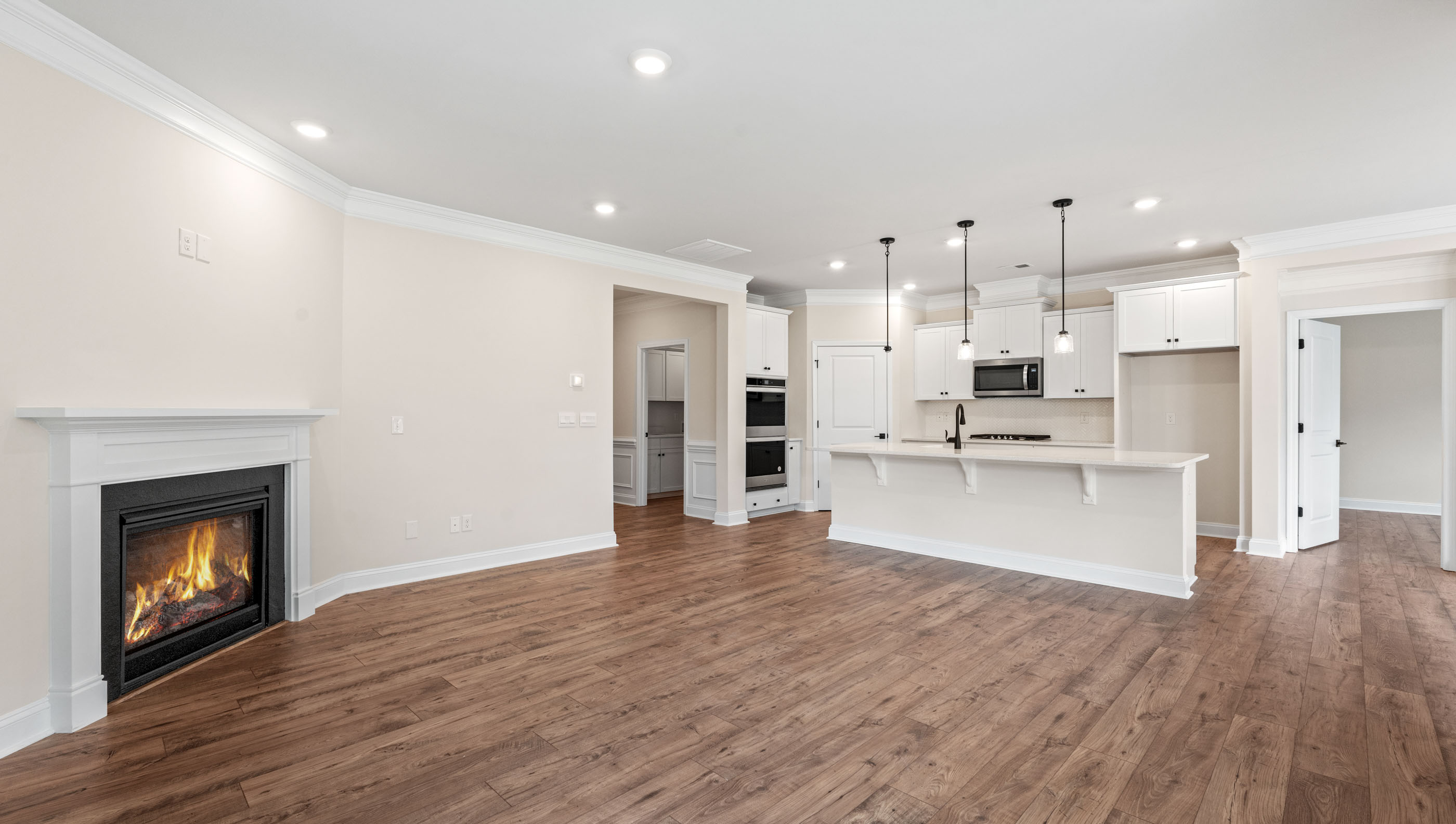 Family room with windows and fireplace.