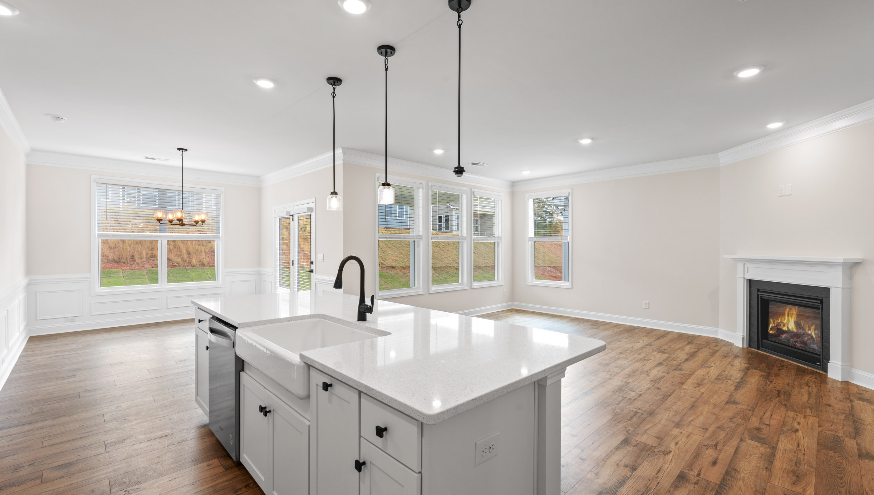 Kitchen and island with granite counter tops.