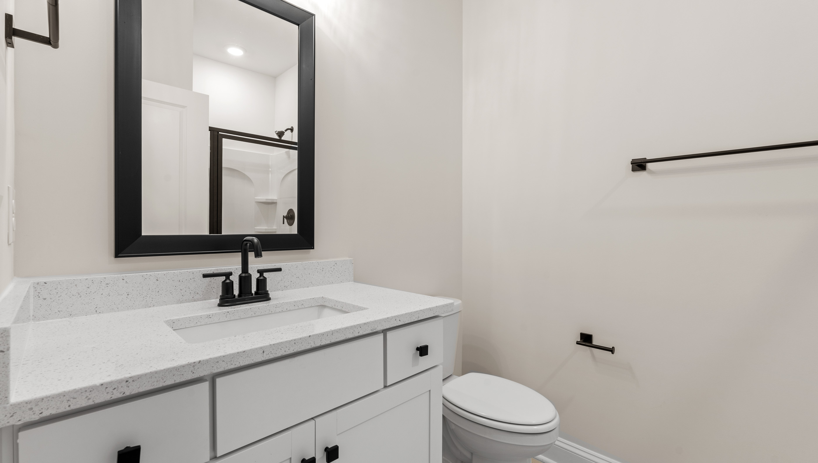 Bathroom with toilet and sink.