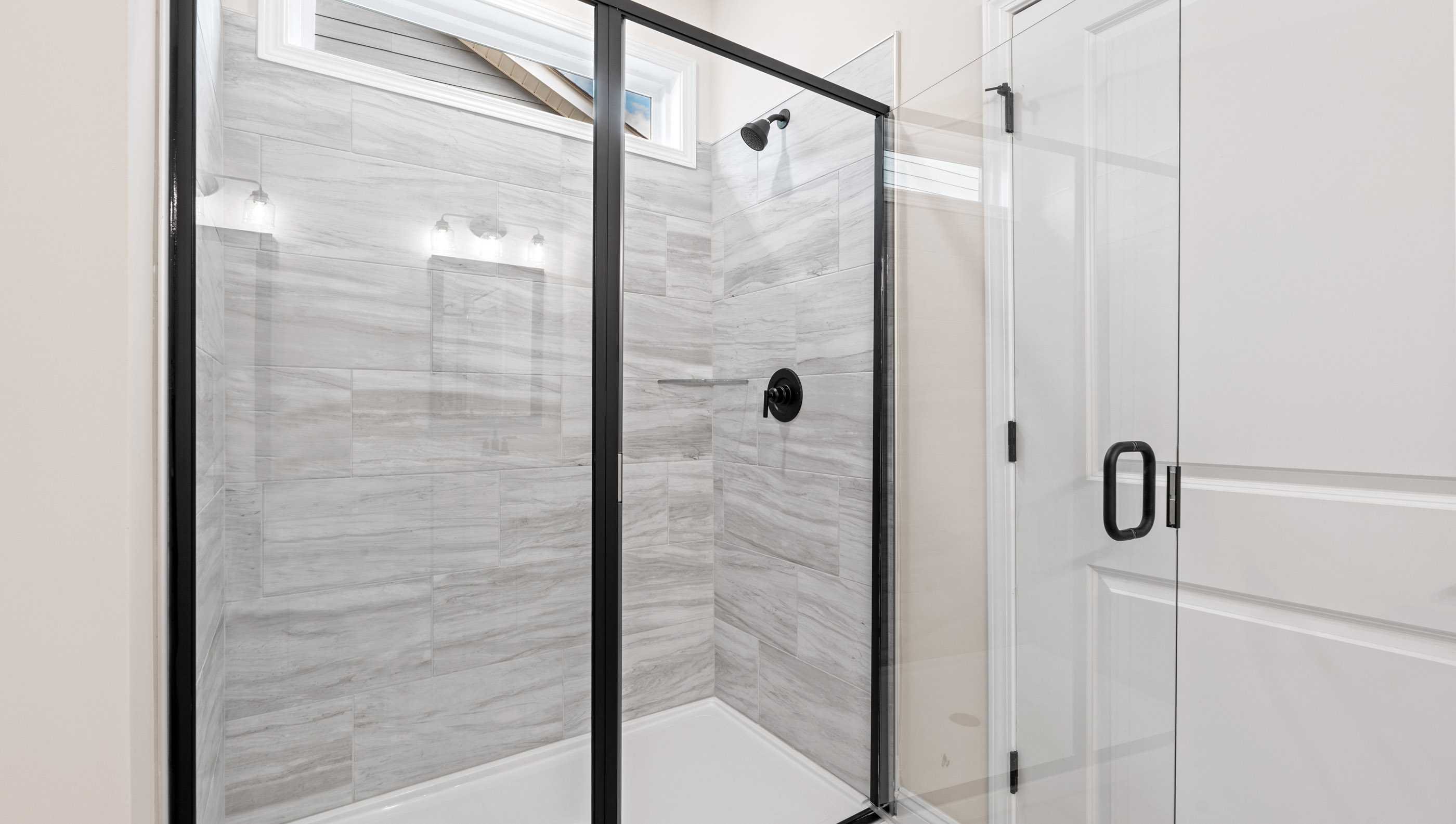 Bathroom with walk in shower.