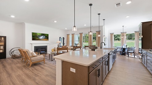 Kitchen with island and cabinets.