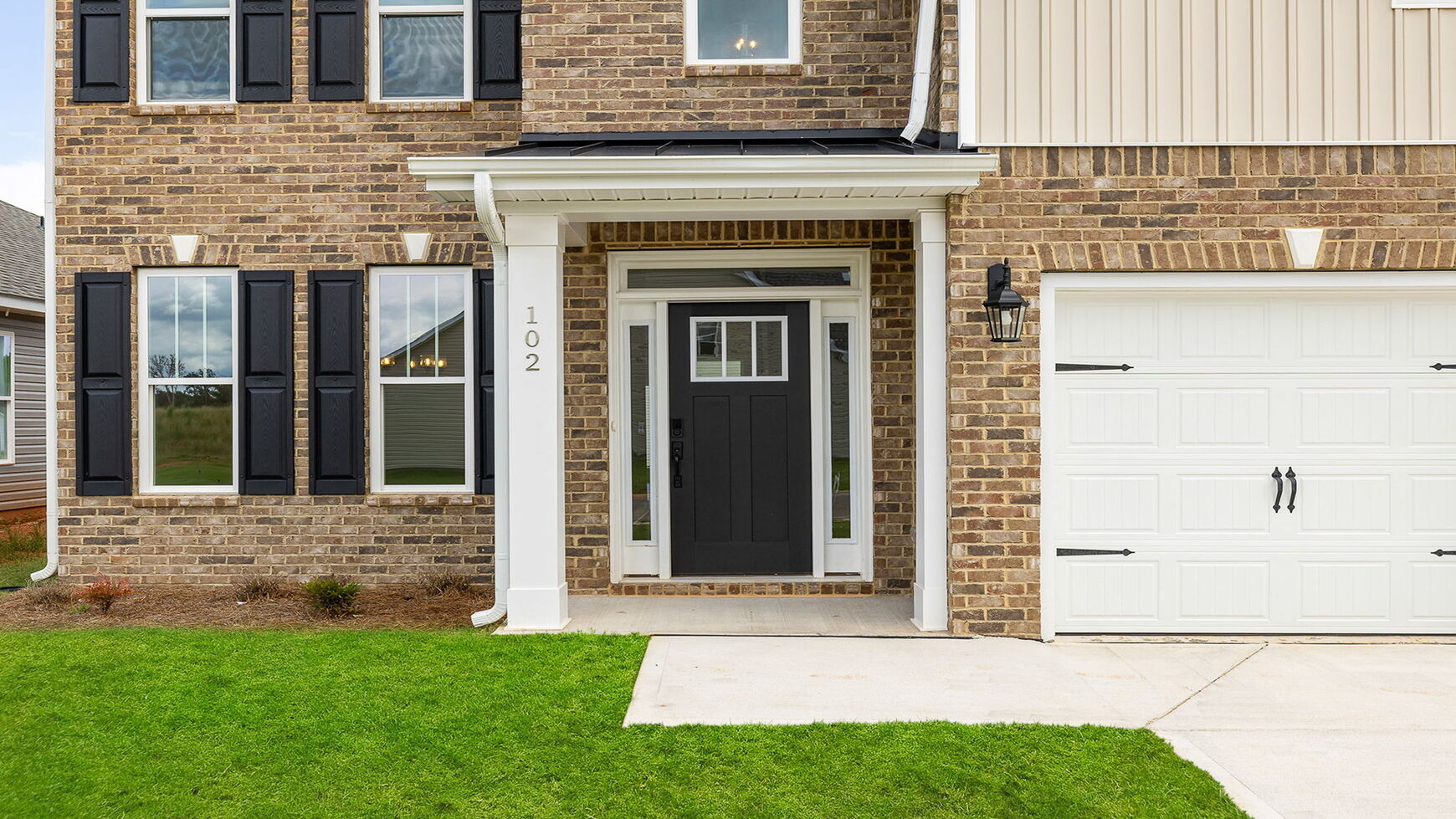Entrance and covered porch.