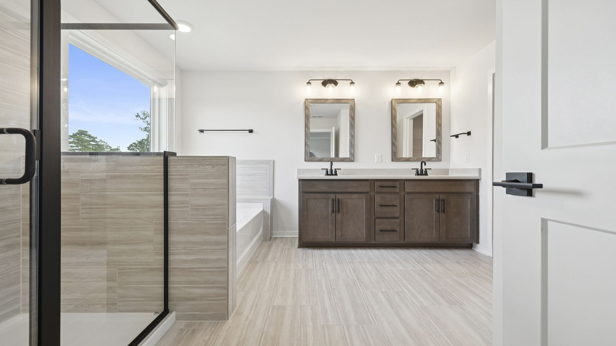 Primary bathroom with dual sink vanity.