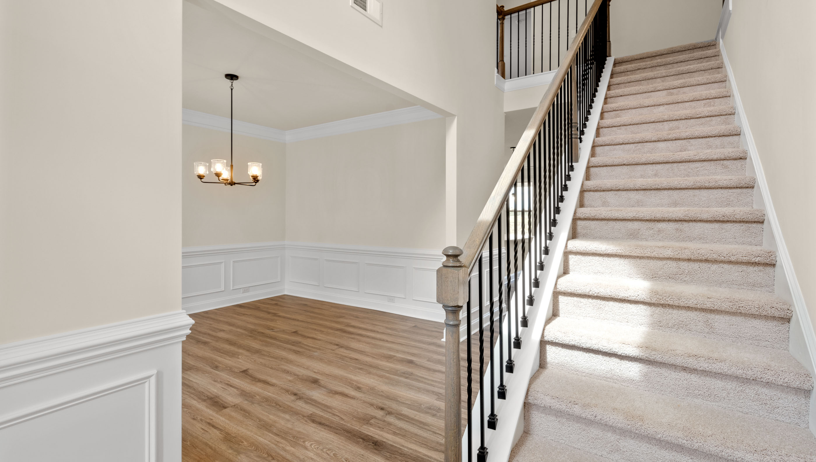 Entry way into home with stairs.