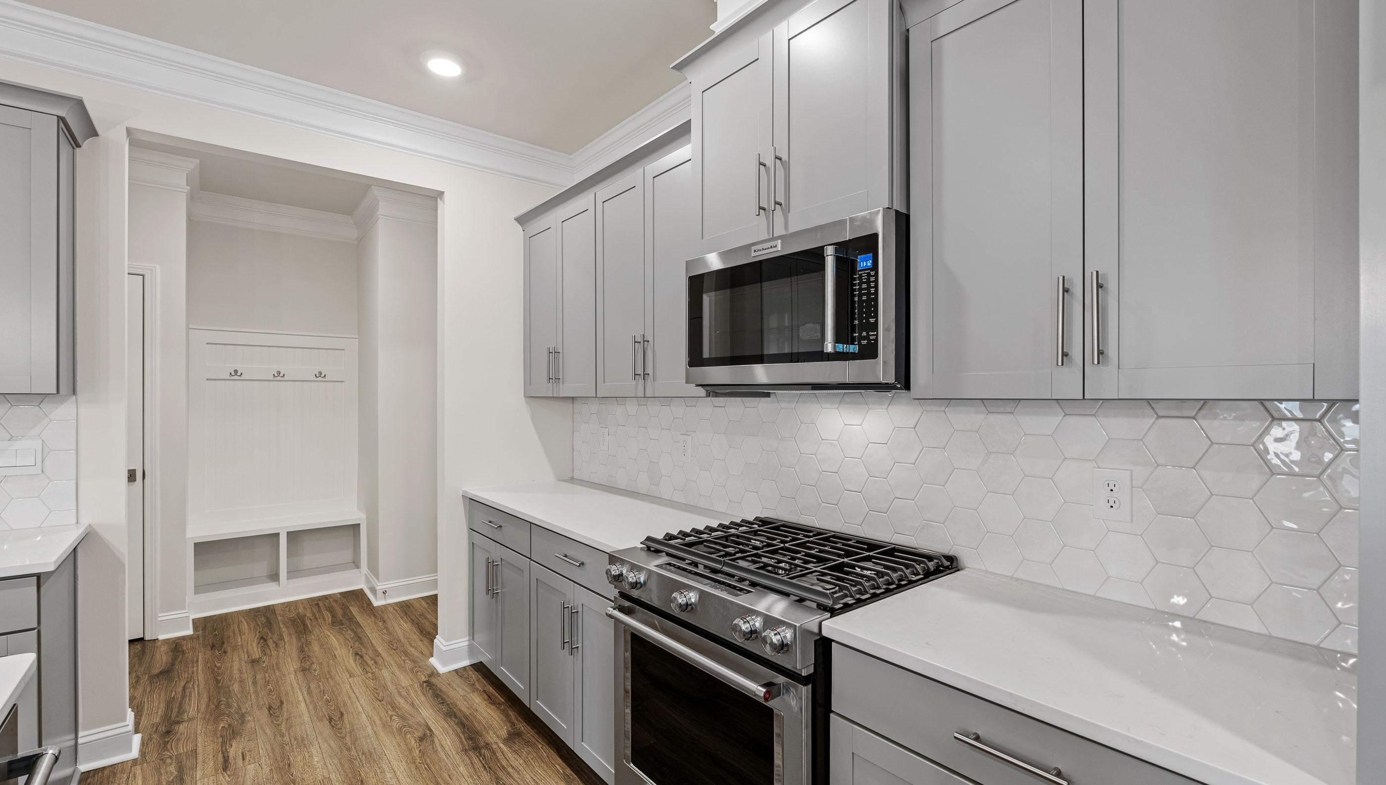 Kitchen with island and cabinets.