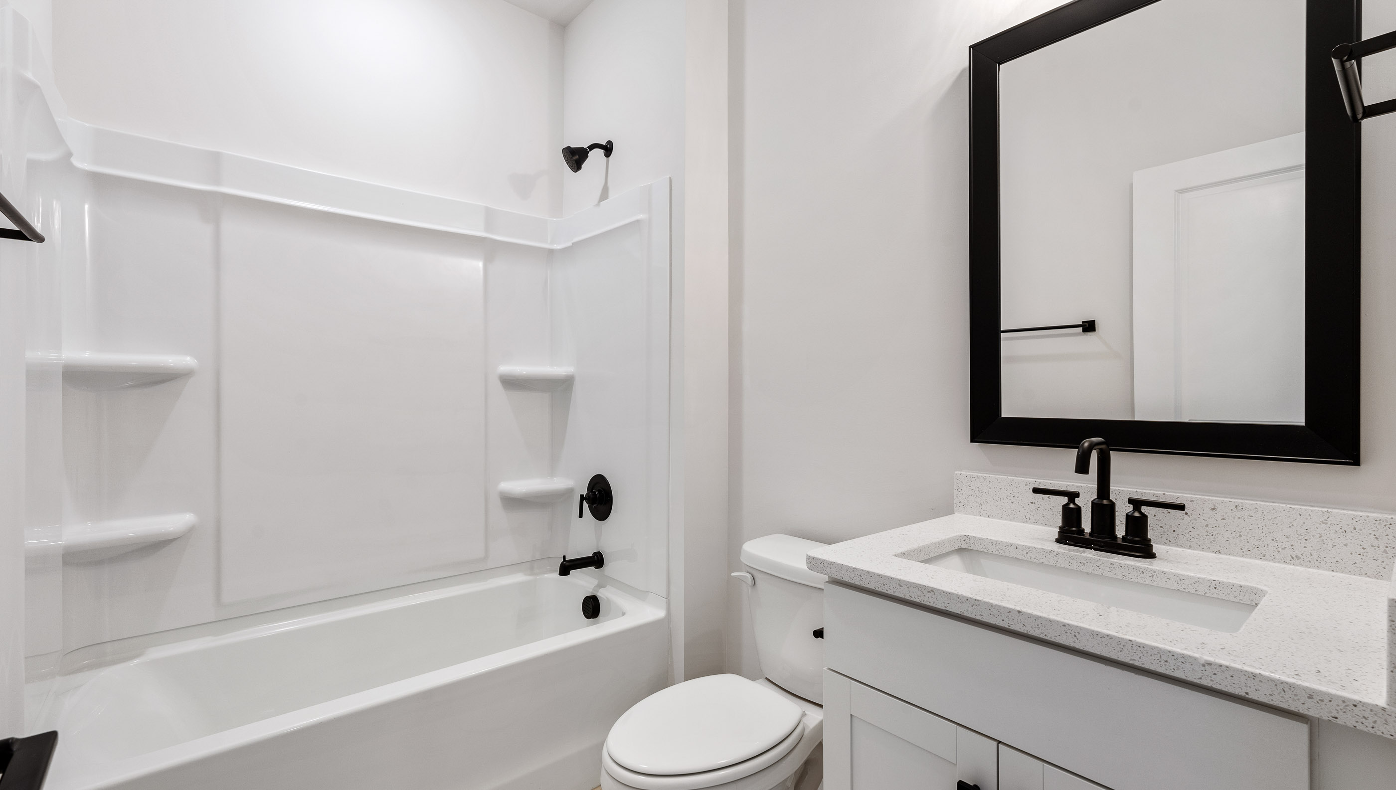 Bathroom with tub and shower.