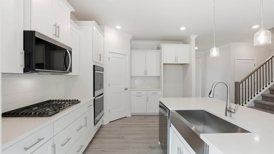 View of kitchen toward entrance.