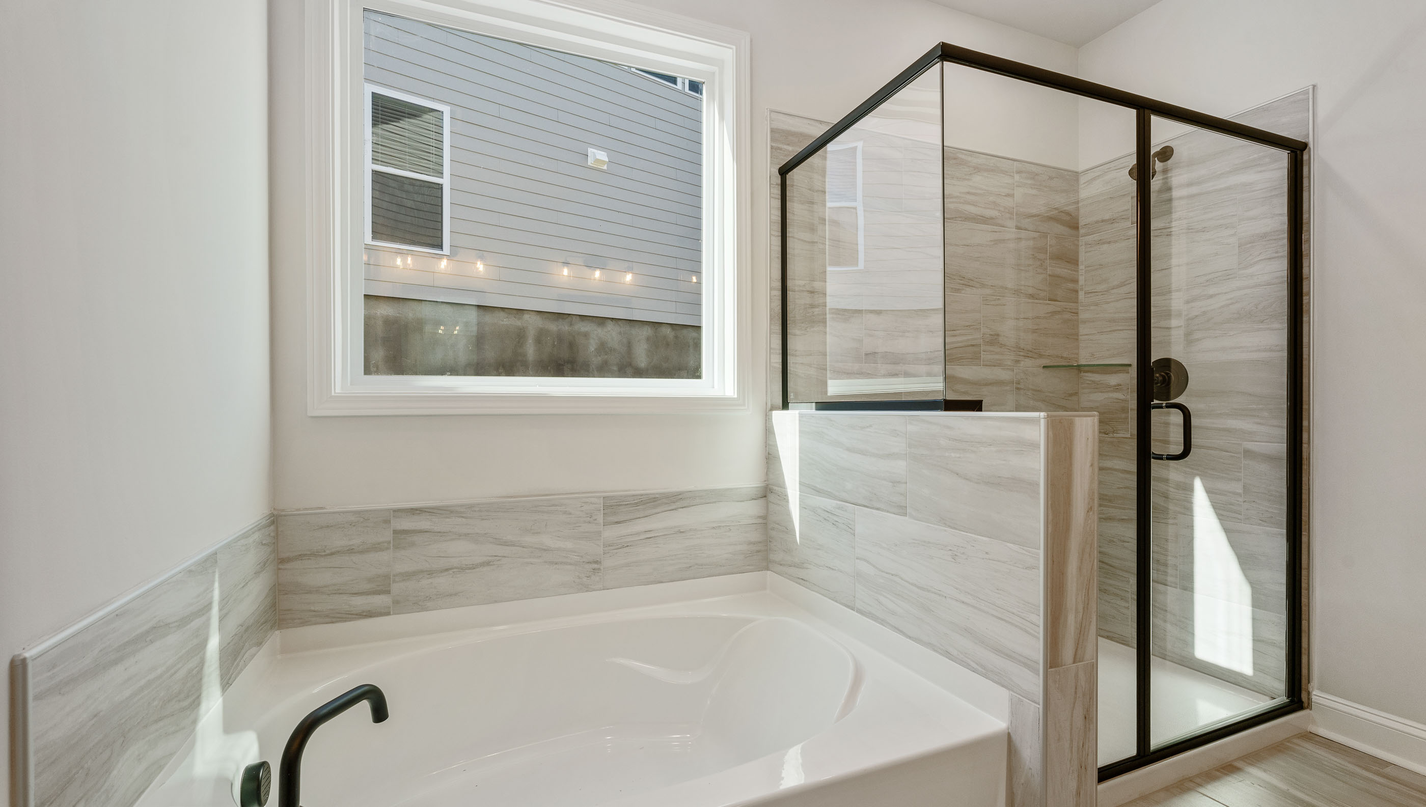 Bathroom with tub and shower.