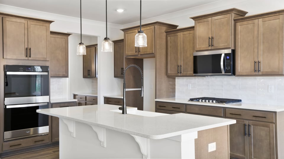 Pendulum lighting and wall ovens.