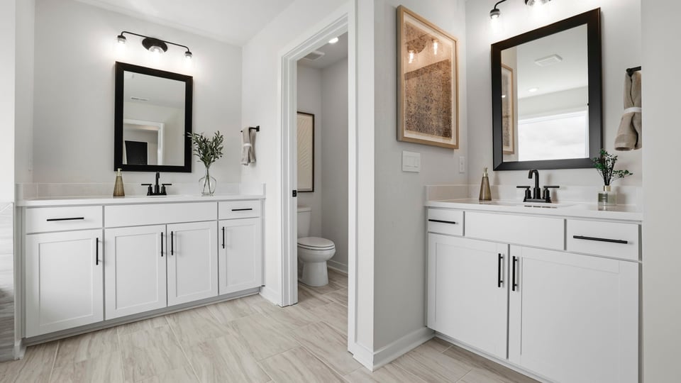 Bathroom with sinks and shower.