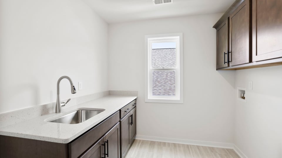 Laundry room with window.