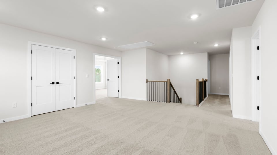 Upper level landing and loft area.