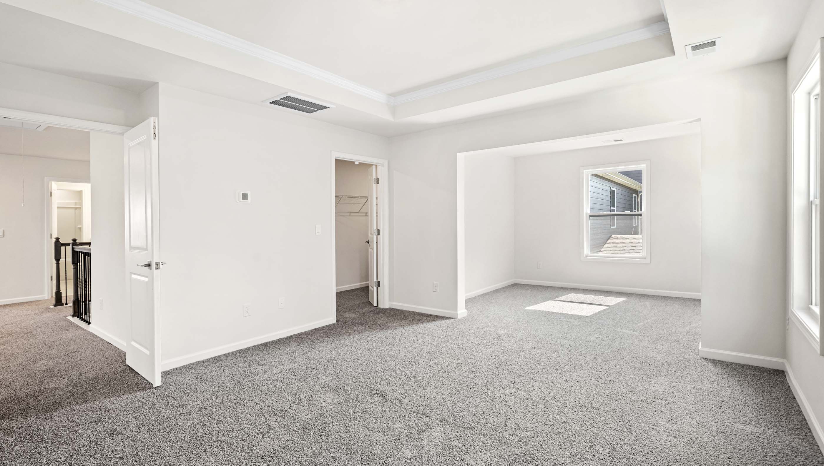 Loft area with carpet.