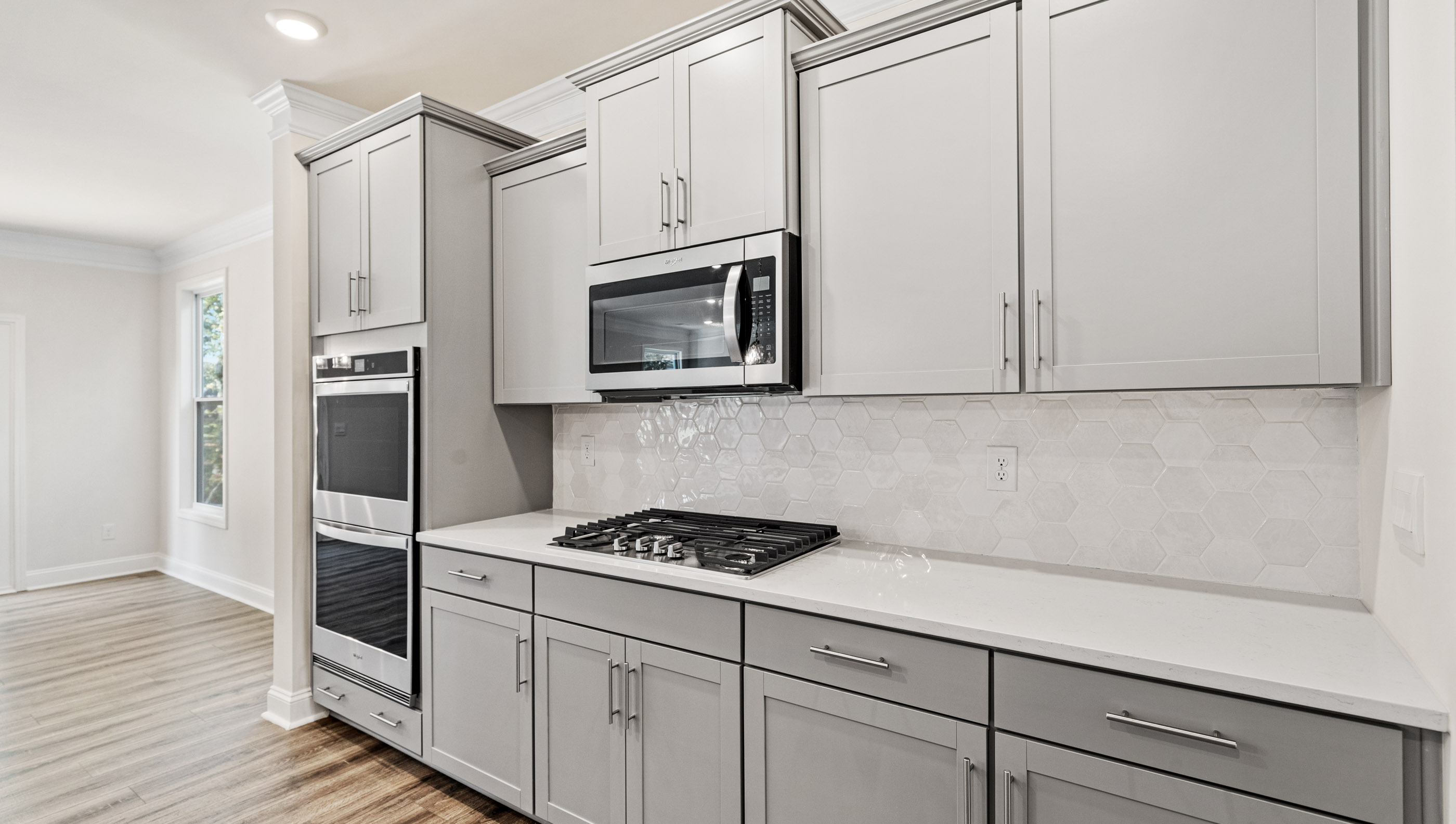 Kitchen with granite counter tops.