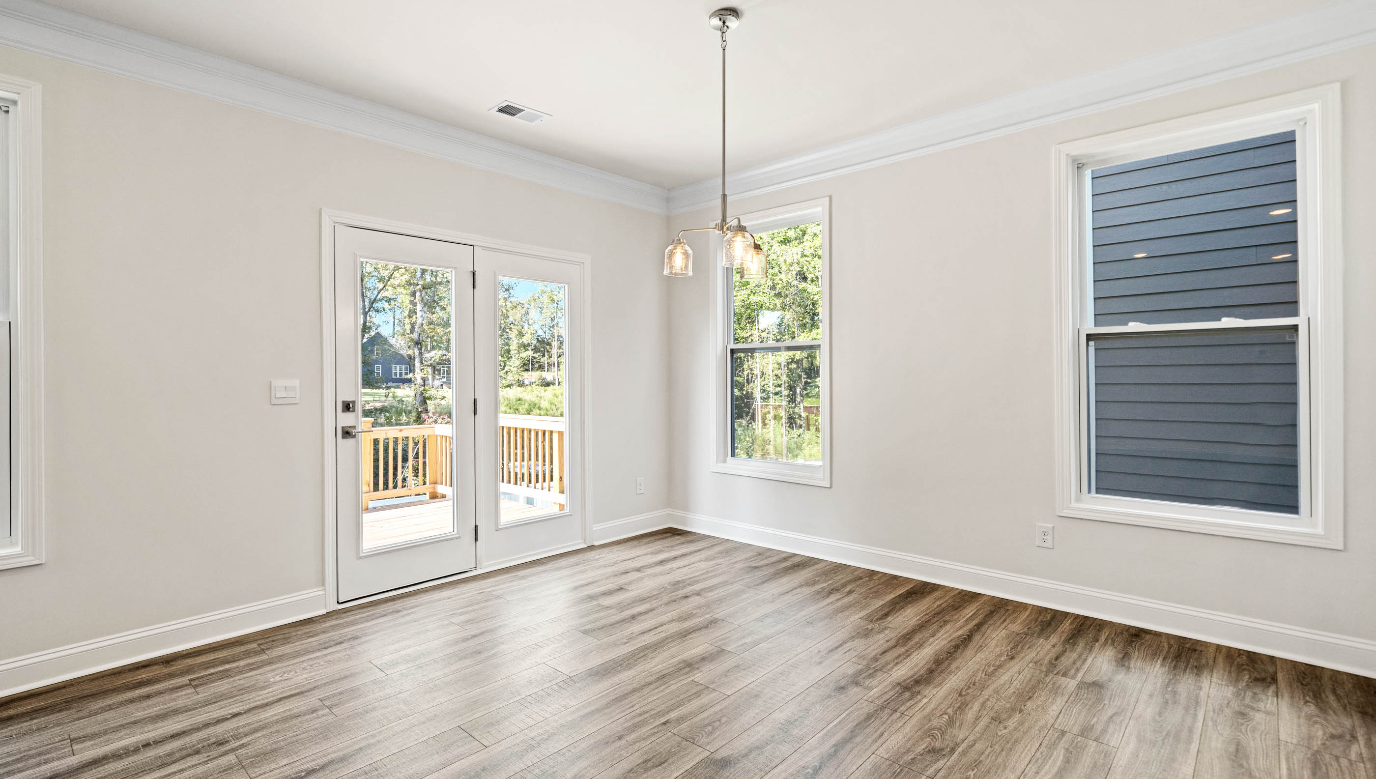 Family room with windows.