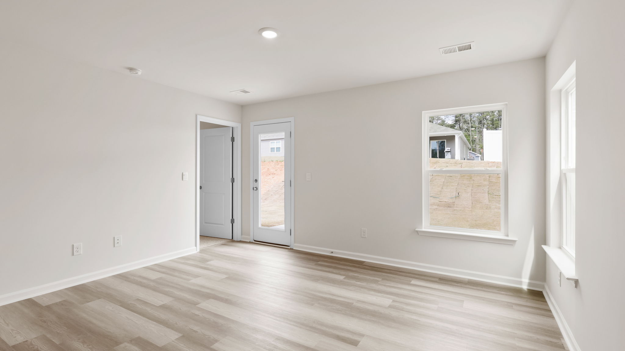 Family room with windows.