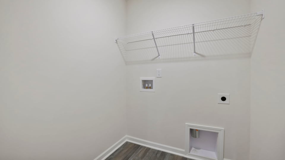 Walk in laundry room.