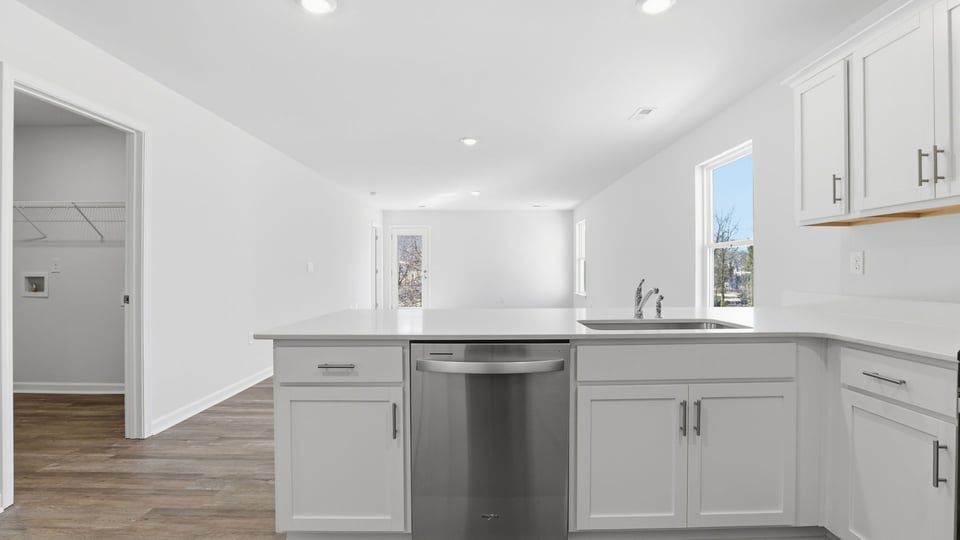 Kitchen with quartz countertops.