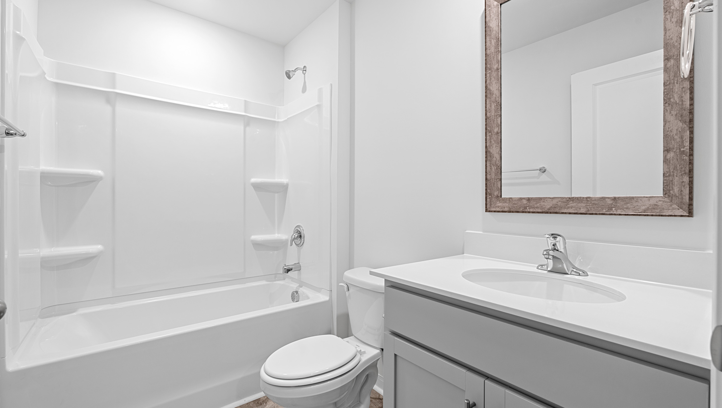 Bathroom with vanity and tub.