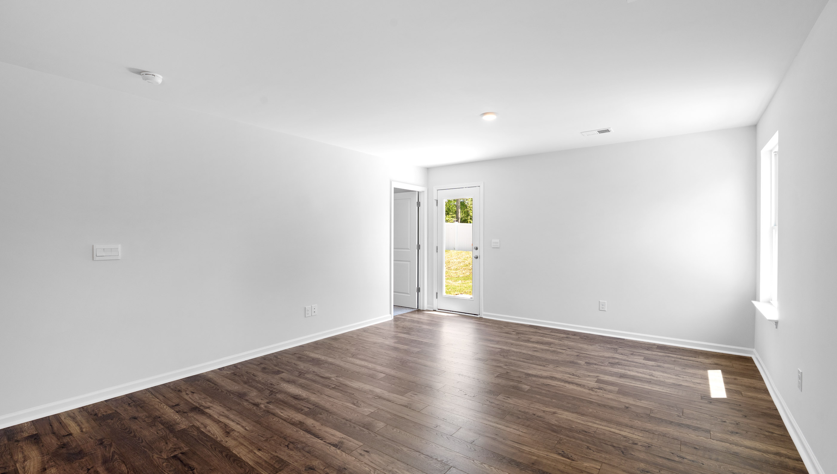 Family room with windows.