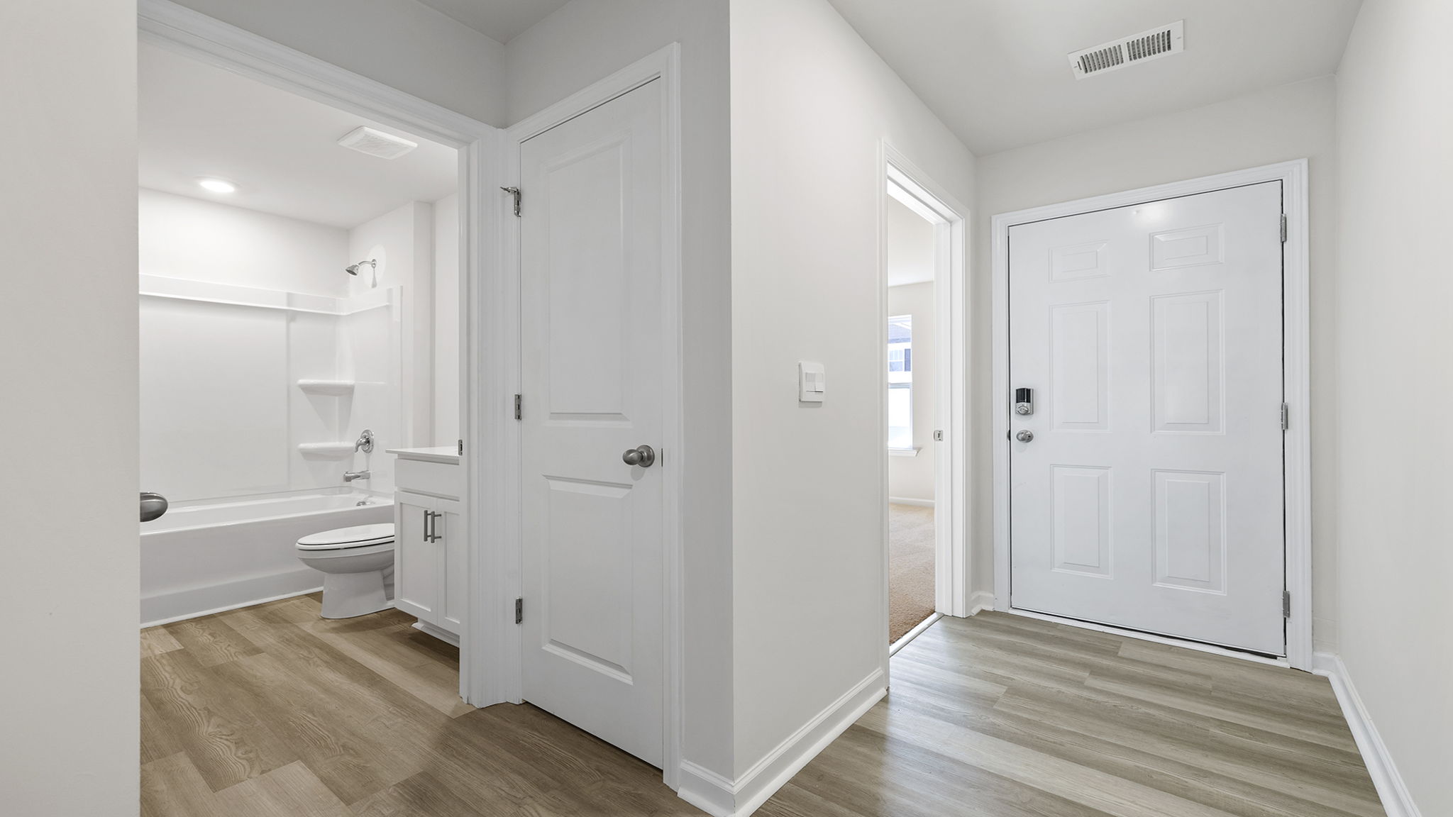 Hallway with view of rooms.