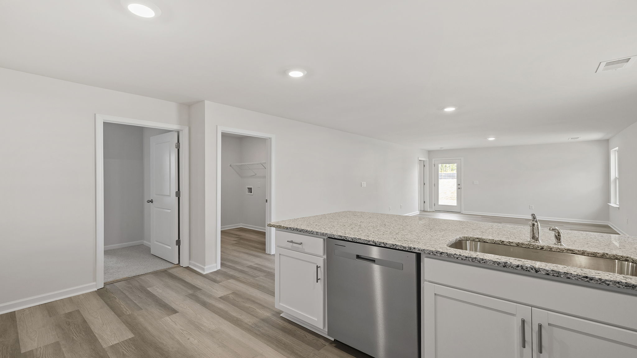 Kitchen with stainless steel appliances.