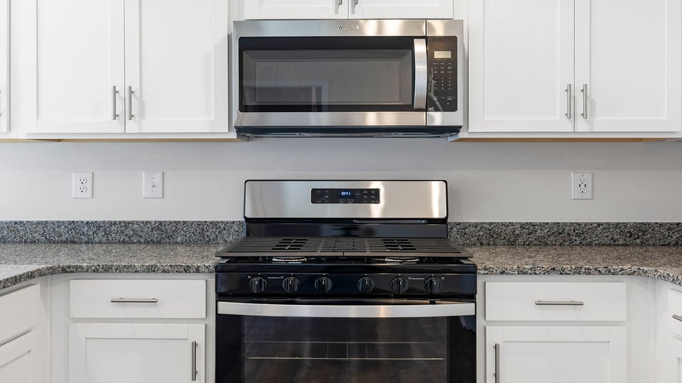 Kitchen with granite countertops.