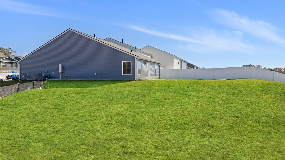 Large backyard of home.