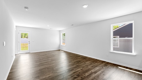 Family room with windows.