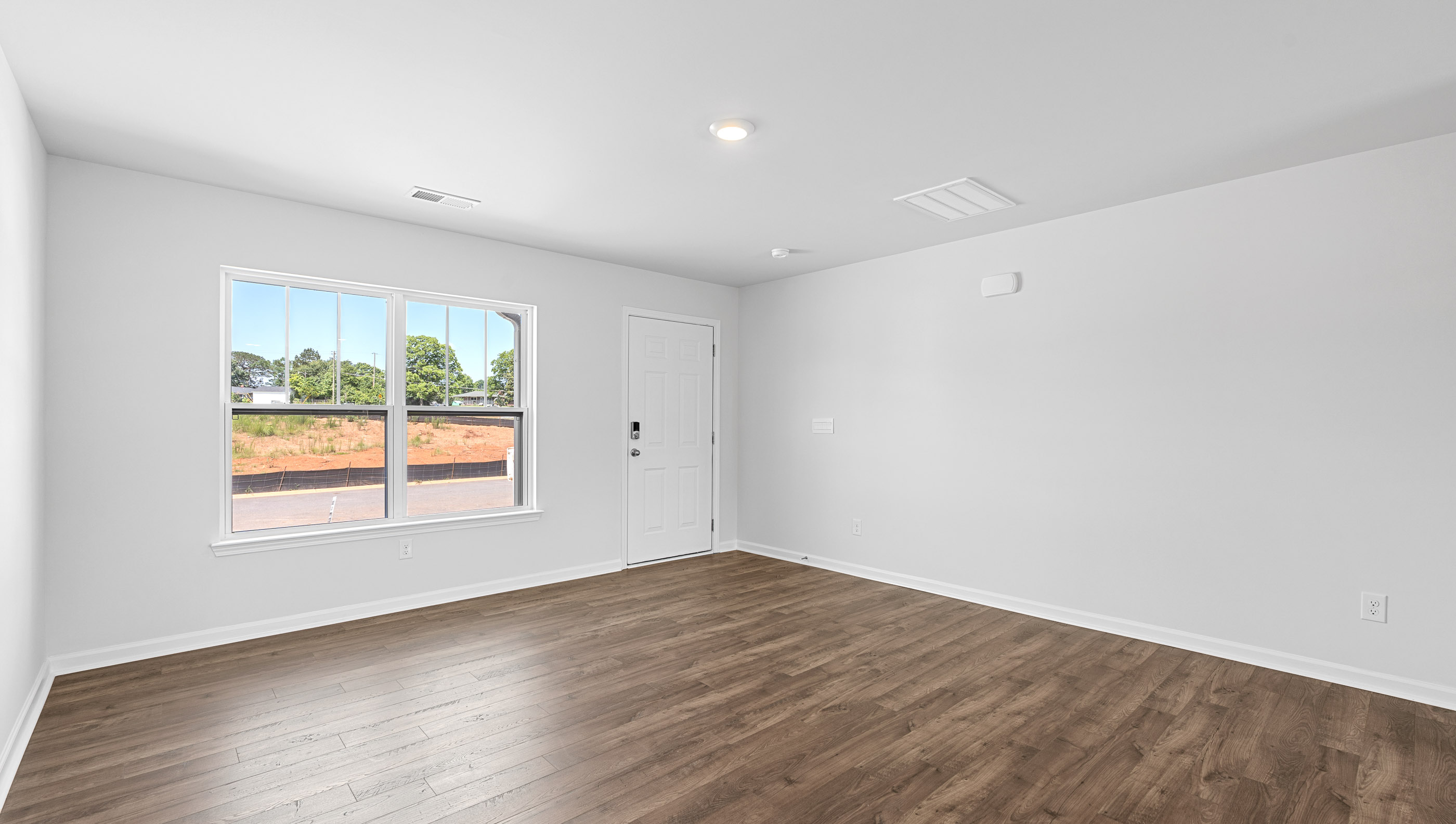 Living room area with windows.