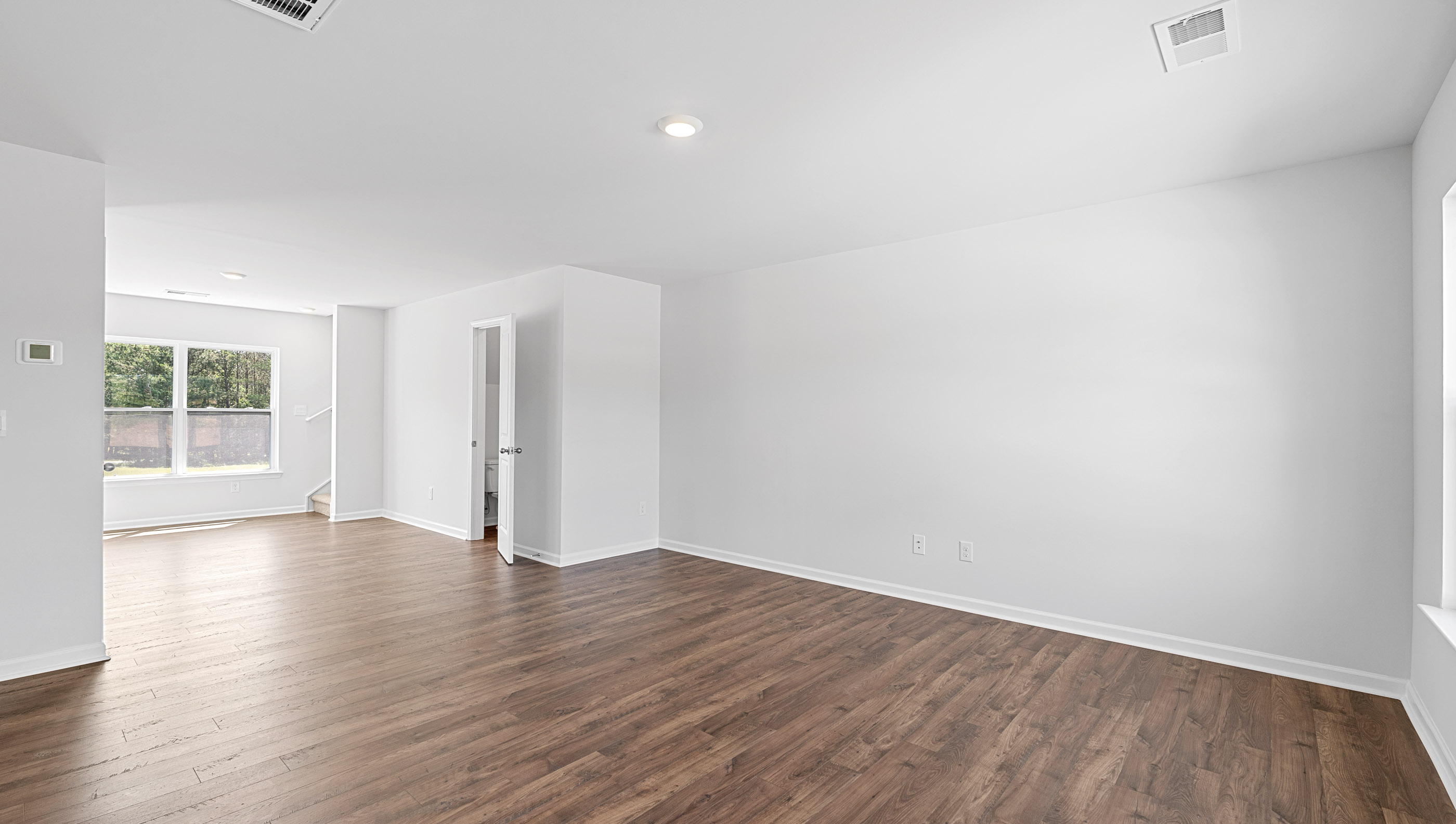 Living room area with windows.