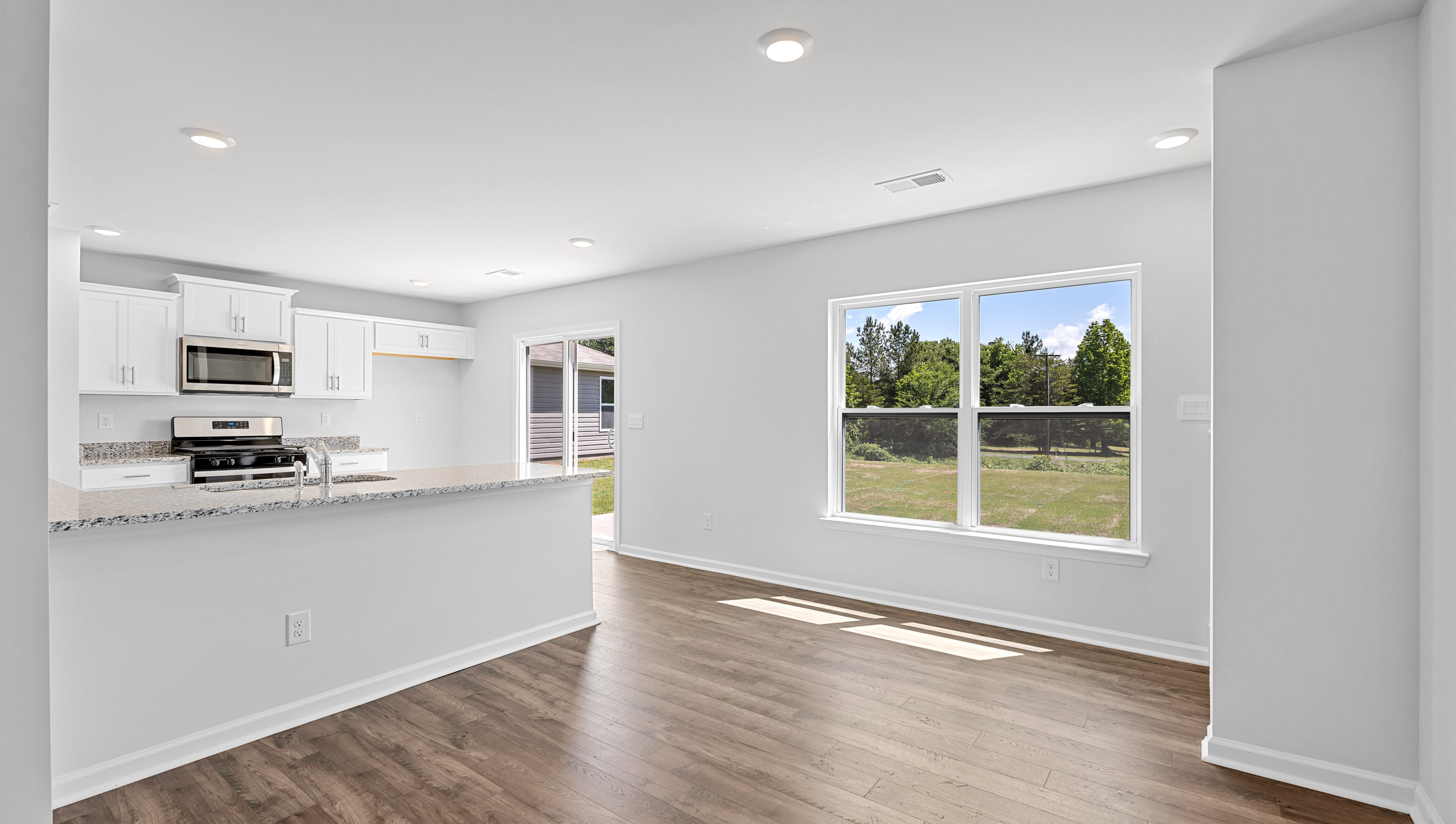 Kitchen with granite counter tops.