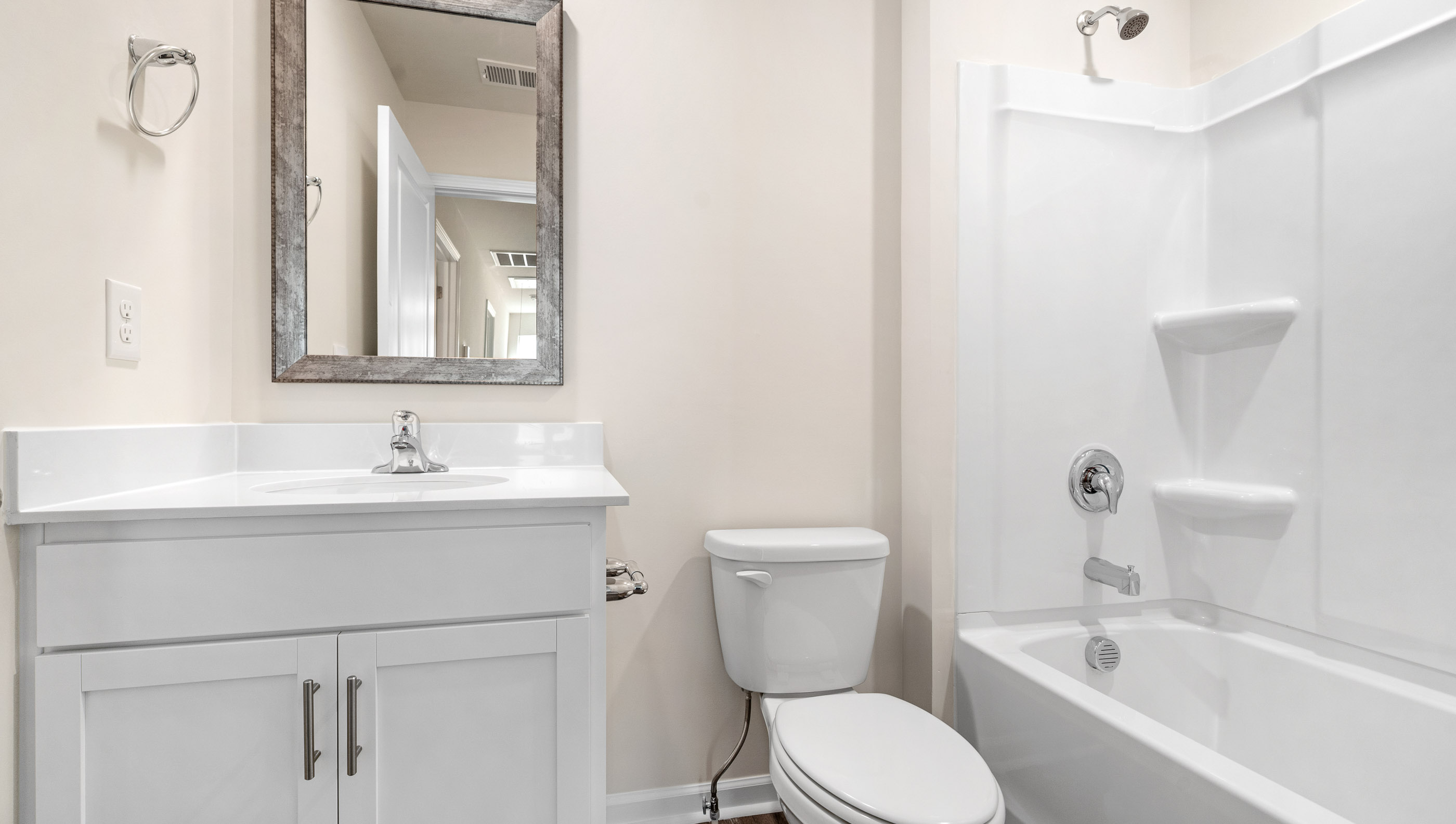 Bathroom with tub and vanity.