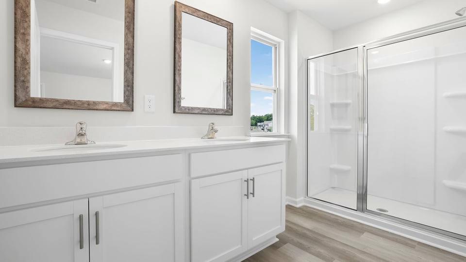 Primary bathroom with double vanity sink.