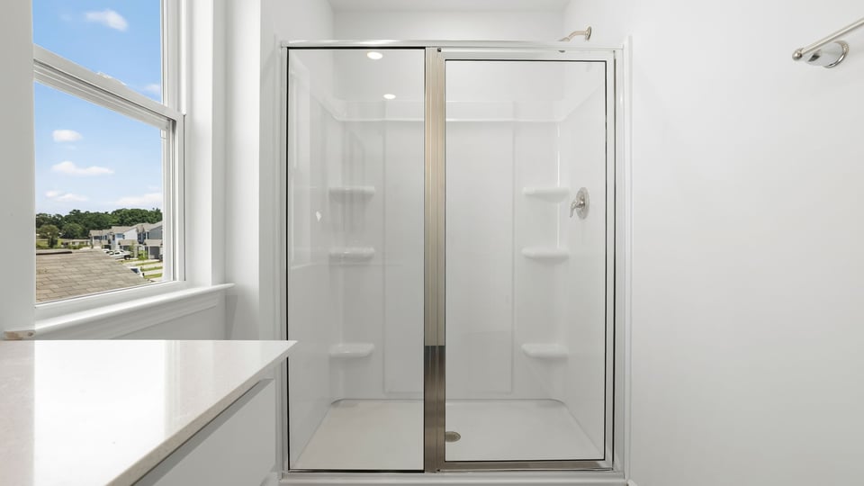 Primary bathroom with double vanity sink.