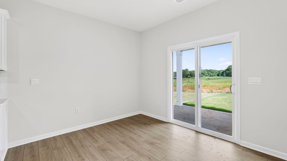 Dining room with sliding door.
