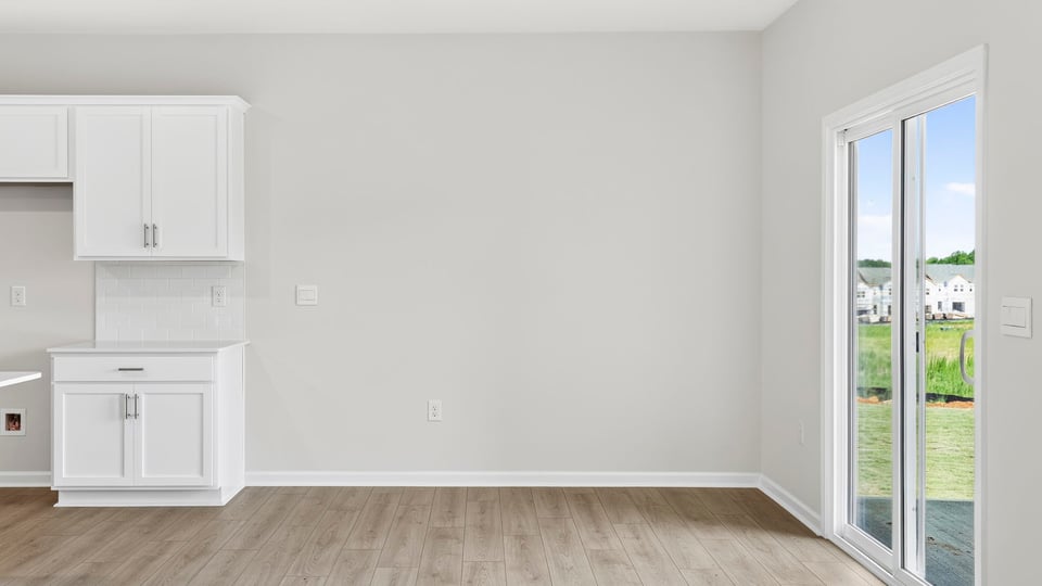 Dining room with sliding door.