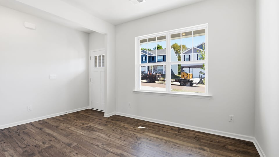 Dining room with window and door.
