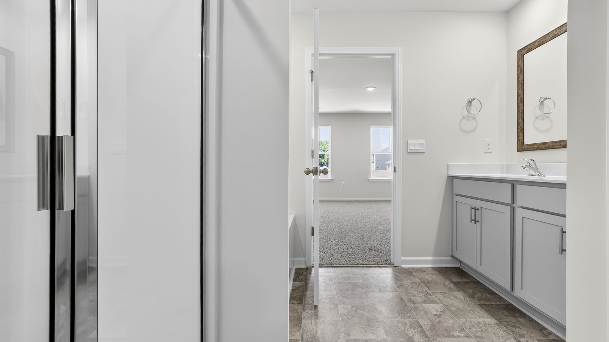 Bathroom with walk in shower.