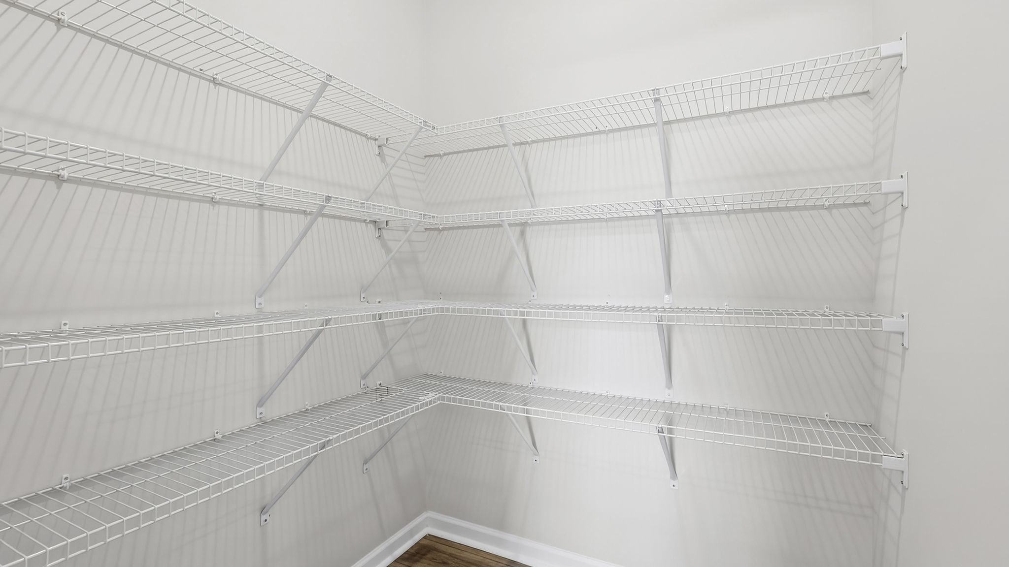 Closet with hanging storage racks.