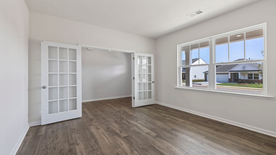 Study with windows and French doors.