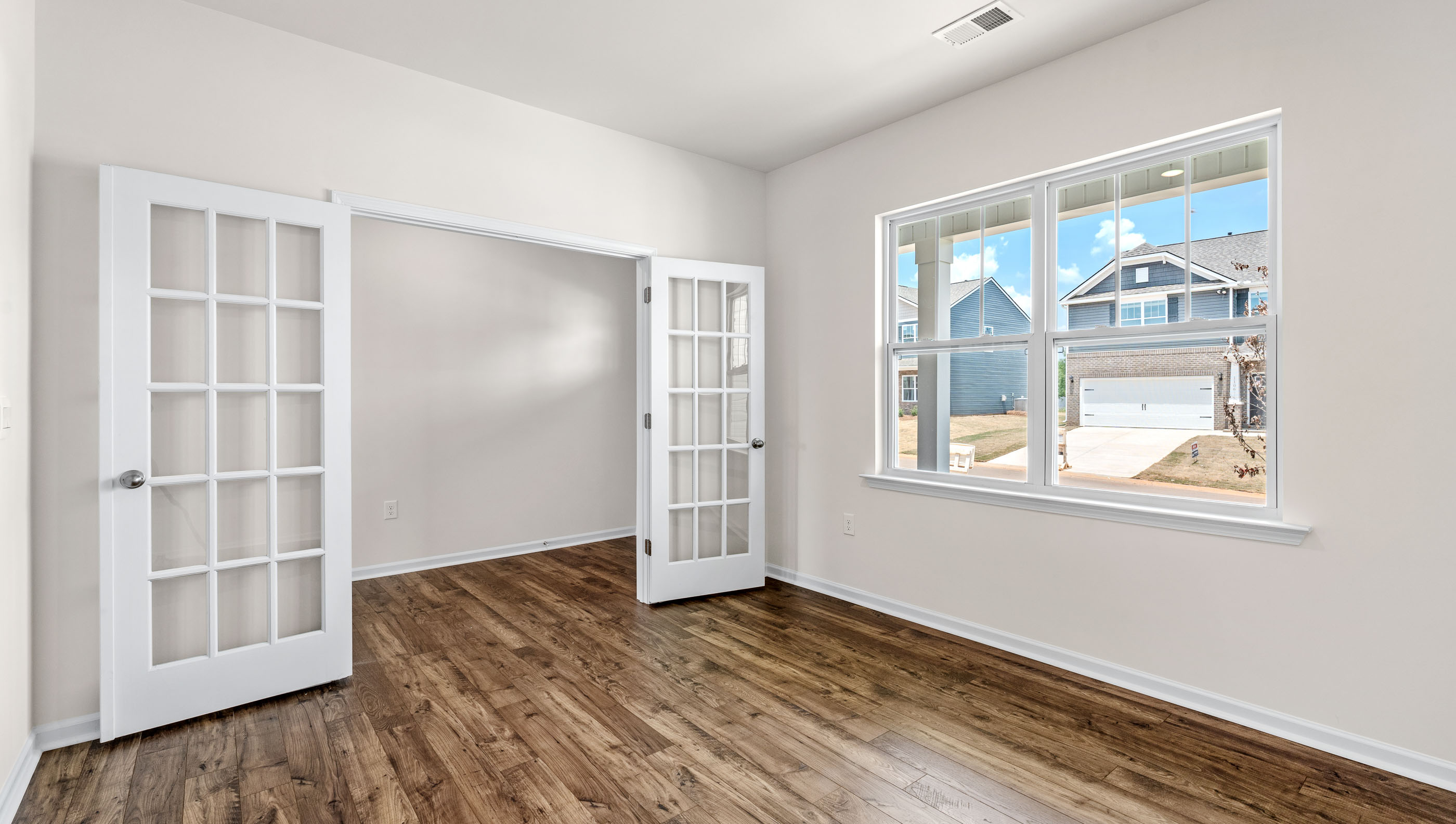 Study with windows and French doors.